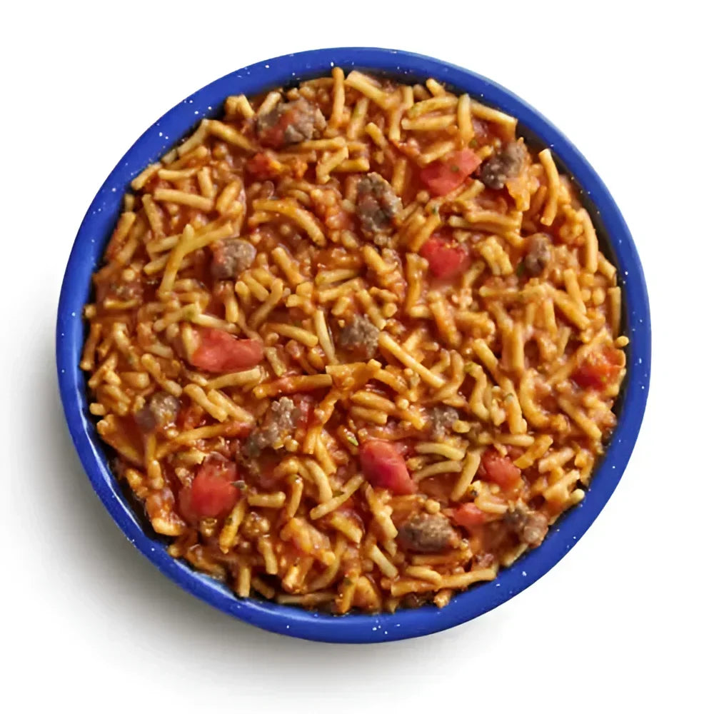 Mountain House Military Spaghetti with Meat Sauce Pro-Pak MCW. Tender spaghetti noodles paired with hearty chunks of beef in a rich and savory marinara sauce.